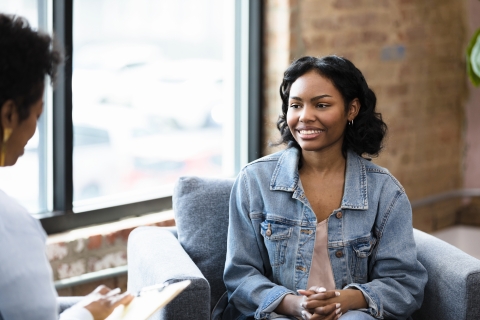 Woman smiling in a therapy session