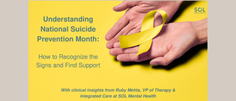 Hands holding yellow ribbon for a blog on national suicide prevention month